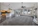 Expansive living room boasts recessed lighting, large windows, and fireplace with tiled surround at 1342 Calle Calma, Henderson, NV 89012
