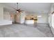 Large living area showcases the open floor plan connecting the kitchen and dining area at 1342 Calle Calma, Henderson, NV 89012