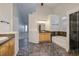 A spacious main bathroom features dual vanities, a soaking tub, and tiled shower at 1342 Calle Calma, Henderson, NV 89012