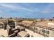 An outdoor patio furnished with comfortable wicker chairs provides great neighborhood views at 1342 Calle Calma, Henderson, NV 89012