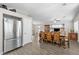 Open-concept dining area with stainless steel appliances, and stylish floors at 1922 Pyle, Las Vegas, NV 89183