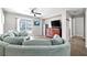 Inviting living room with a large sectional sofa, hardwood floors, and backyard access at 1922 Pyle, Las Vegas, NV 89183