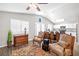 Cozy living room with a plant, dining table, and comfortable seating with natural light at 1922 Pyle, Las Vegas, NV 89183