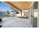 An outdoor covered patio leads to a backyard pool and additional backyard structures at 1922 Pyle, Las Vegas, NV 89183