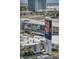 Aerial view of the surrounding cityscape, buildings, and palm trees at 200 W Sahara Ave # 2404, Las Vegas, NV 89102