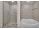 Modern bathroom with a glass shower and a separate soaking tub at 200 W Sahara Ave # 2404, Las Vegas, NV 89102