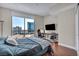 Bright bedroom with a modern desk and a large window showcasing city views at 200 W Sahara Ave # 2404, Las Vegas, NV 89102