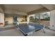 Outdoor game room featuring ping pong table, pool table, and comfortable seating for entertainment and recreation at 200 W Sahara Ave # 2404, Las Vegas, NV 89102