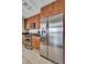Bright kitchen featuring stainless steel appliances, wood cabinets, and a modern design at 200 W Sahara Ave # 2404, Las Vegas, NV 89102