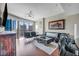 Contemporary living room with city views, leather sofa, and designer decor at 200 W Sahara Ave # 2404, Las Vegas, NV 89102