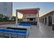 Stylish outdoor bar area with seating, grill, and TV perfect for entertaining and enjoying outdoor living at 200 W Sahara Ave # 2404, Las Vegas, NV 89102