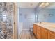 Bathroom featuring a double sink vanity, bathtub, and shower at 208 Lynbrook St, Henderson, NV 89012