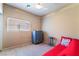 Neutral bedroom with a bed, a dresser, and a window at 208 Lynbrook St, Henderson, NV 89012