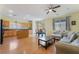 Open floor plan integrates the kitchen, dining, and living areas for flexible living and entertaining at 208 Lynbrook St, Henderson, NV 89012