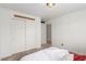Bright bedroom featuring plush carpet, a large closet, and fresh white walls at 209 Eucalyptus Ln, Mesquite, NV 89027