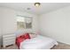 Bedroom with a single bed, carpet flooring, neutral colored walls, and a window with blinds at 209 Eucalyptus Ln, Mesquite, NV 89027