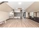 Large bonus room with built-in media center, bar and hardwood floors at 209 Eucalyptus Ln, Mesquite, NV 89027