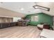 Spacious bonus room with a built-in bar and wood-look flooring at 209 Eucalyptus Ln, Mesquite, NV 89027