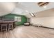 Spacious bonus room with a built-in bar and wood-look flooring at 209 Eucalyptus Ln, Mesquite, NV 89027