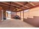 Cozy covered patio, complete with a ceiling fan and an outdoor dining area at 209 Eucalyptus Ln, Mesquite, NV 89027