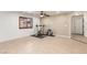Open exercise room with tile flooring, neutral paint, and workout equipment at 209 Eucalyptus Ln, Mesquite, NV 89027