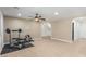 Open exercise room with tile flooring, neutral paint, and workout equipment at 209 Eucalyptus Ln, Mesquite, NV 89027