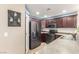This kitchen features stainless steel appliances, wood cabinetry, and ample countertop space at 209 Eucalyptus Ln, Mesquite, NV 89027