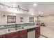 Open kitchen features stainless steel appliances, a tile backsplash, and recessed lighting at 209 Eucalyptus Ln, Mesquite, NV 89027