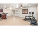 Spacious living room with tile flooring, neutral paint, and a ceiling fan with lighting at 209 Eucalyptus Ln, Mesquite, NV 89027