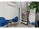 Bright interior with unique spiral stairs, modern furniture, and decorative accents, creating a cozy and stylish atmosphere at 214 S Maryland Pkwy, Las Vegas, NV 89101