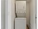 Efficient laundry room features a stacked washer and dryer, maximizing space in a compact design at 214 S Maryland Pkwy, Las Vegas, NV 89101