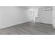 Spacious living area with gray flooring, natural light, and modern finishes, creating a clean and comfortable environment at 214 S Maryland Pkwy, Las Vegas, NV 89101