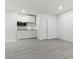 Bright living space features fresh paint, and modern gray flooring, offering a blank canvas for personalization at 214 S Maryland Pkwy, Las Vegas, NV 89101