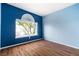 Bedroom featuring a large window with neighborhood view at 2401 Rice Flower Cir, Las Vegas, NV 89134
