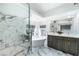 Beautiful bathroom features a modern tub, glass shower, and double sink vanity at 2401 Rice Flower Cir, Las Vegas, NV 89134