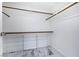 Walk-in closet with marble floors and shelving unit at 2401 Rice Flower Cir, Las Vegas, NV 89134