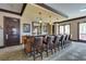 Stylish bar area with seating, elegant lighting, and sophisticated decor at 2405 W Serene Ave # 236, Las Vegas, NV 89123