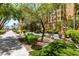 Picturesque courtyard view with lush landscaping and cozy seating areas at 2405 W Serene Ave # 236, Las Vegas, NV 89123