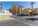 Beautiful condominium complex, Boca Raton, with attractive landscaping and elegant entrance at 2405 W Serene Ave # 236, Las Vegas, NV 89123