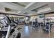 Well-equipped gym featuring modern exercise machines and mirrored walls at 2405 W Serene Ave # 236, Las Vegas, NV 89123