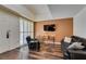 Comfortable living room featuring hardwood floors, stylish furniture, and natural light at 2405 W Serene Ave # 236, Las Vegas, NV 89123