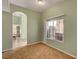 Cozy dining area with neutral paint, arched doorways, and lots of natural light at 2435 Paddock Ln, Las Vegas, NV 89156