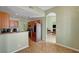 Cozy eat-in kitchen features wood cabinets and modern stainless steel appliances at 2435 Paddock Ln, Las Vegas, NV 89156