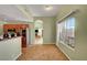 An eat-in kitchen with stainless steel appliances and views into the living spaces at 2435 Paddock Ln, Las Vegas, NV 89156