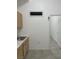 Kitchenette with cabinets, stainless steel sink, and white marble countertop at 2435 Paddock Ln, Las Vegas, NV 89156