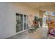 Covered patio with outdoor furniture and grill at 2435 Paddock Ln, Las Vegas, NV 89156
