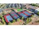 Aerial view showcasing the multiple tennis courts and community amenities at 2561 Cosmic Dust St, Henderson, NV 89044