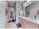 Bright bathroom featuring double sinks, and decorative towels at 2561 Cosmic Dust St, Henderson, NV 89044