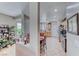 Bright kitchen with tile floor, stainless appliances, and convenient eat-in dining area at 2561 Cosmic Dust St, Henderson, NV 89044