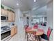 Eat-in kitchen features stainless steel appliances and wooden cabinetry at 2561 Cosmic Dust St, Henderson, NV 89044